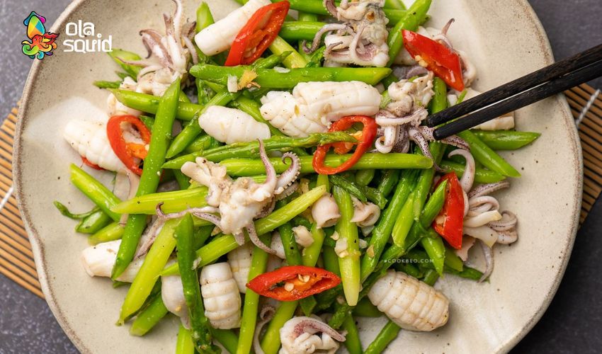 Cách làm mực xào mướp thanh mát chinh mục mọi vị giác 7 Mực xào măng tây bắt mắt và ngon miệng.